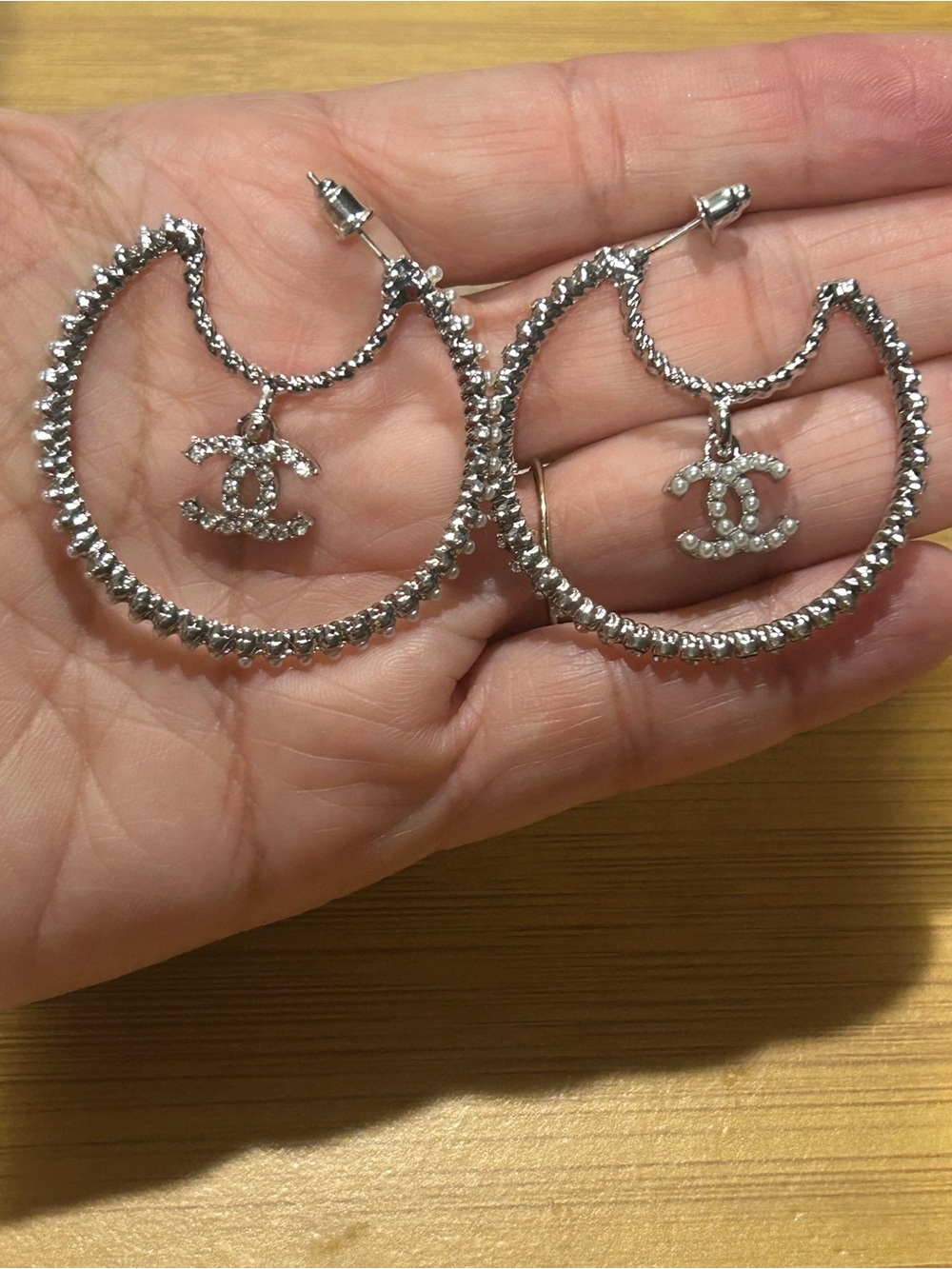 Beautiful silver tone crystal/ rhinestone hoop earrings with dangling C charm